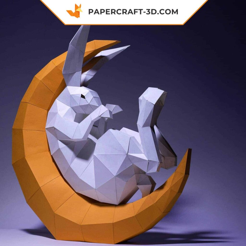 Papercraft lapin dans un croissant de lune en origami