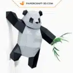 Papercraft Panda grimpant sur un mur en origami papier 3D