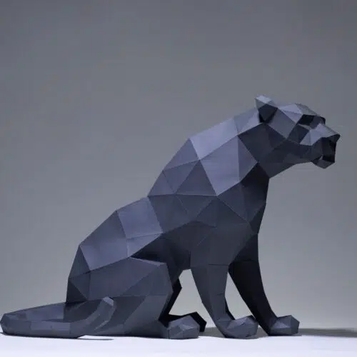 Papercraft black panther sitting in origami