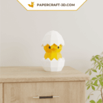 Papercraft pollito en un huevo en origami 3D