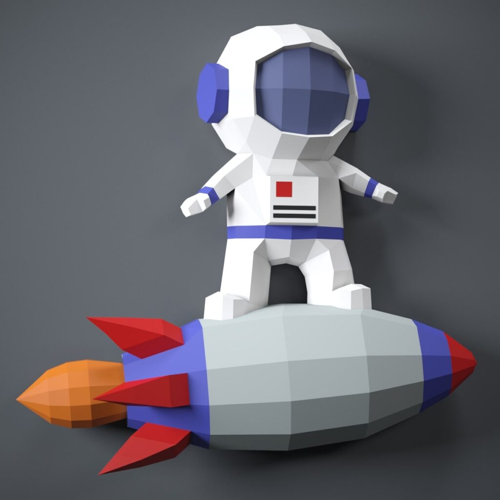 Papercraft d'astronaute sur fusée en origami 3D