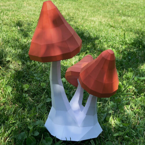 Papercraft von roten Pilzen in 3D-Origami