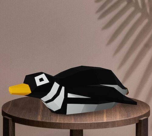 Papercraft de pingouin allongé en origami 3D