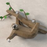 Papercraft de paresseux sur branche en origami