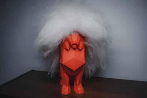 Papercraft di leone seduto in origami 3D
