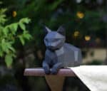 Papercraft 3D cat with hanging paws origami