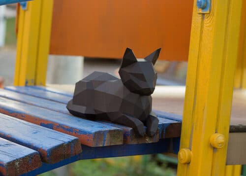 Papercraft 3D cat with hanging paws origami