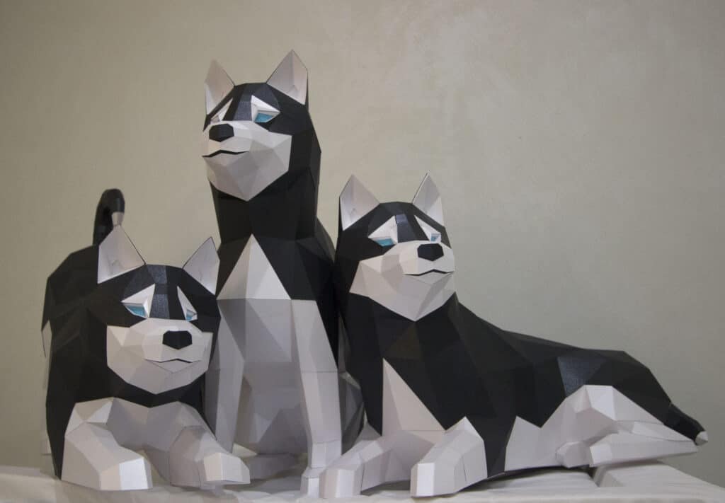 Papercraft de husky allongé en origami 3D Papercraft de husky allongé en origami 3D